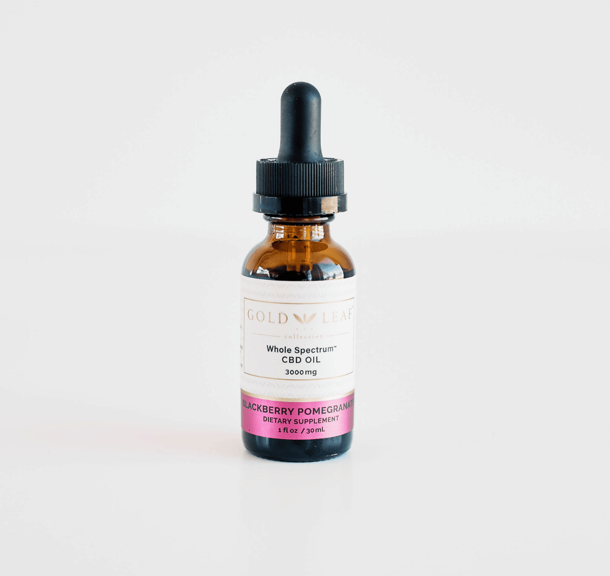 Amber tincture bottle with a dropper filled with high-potency CBD oil showcased on a pristine white background, highlighting the product's purity